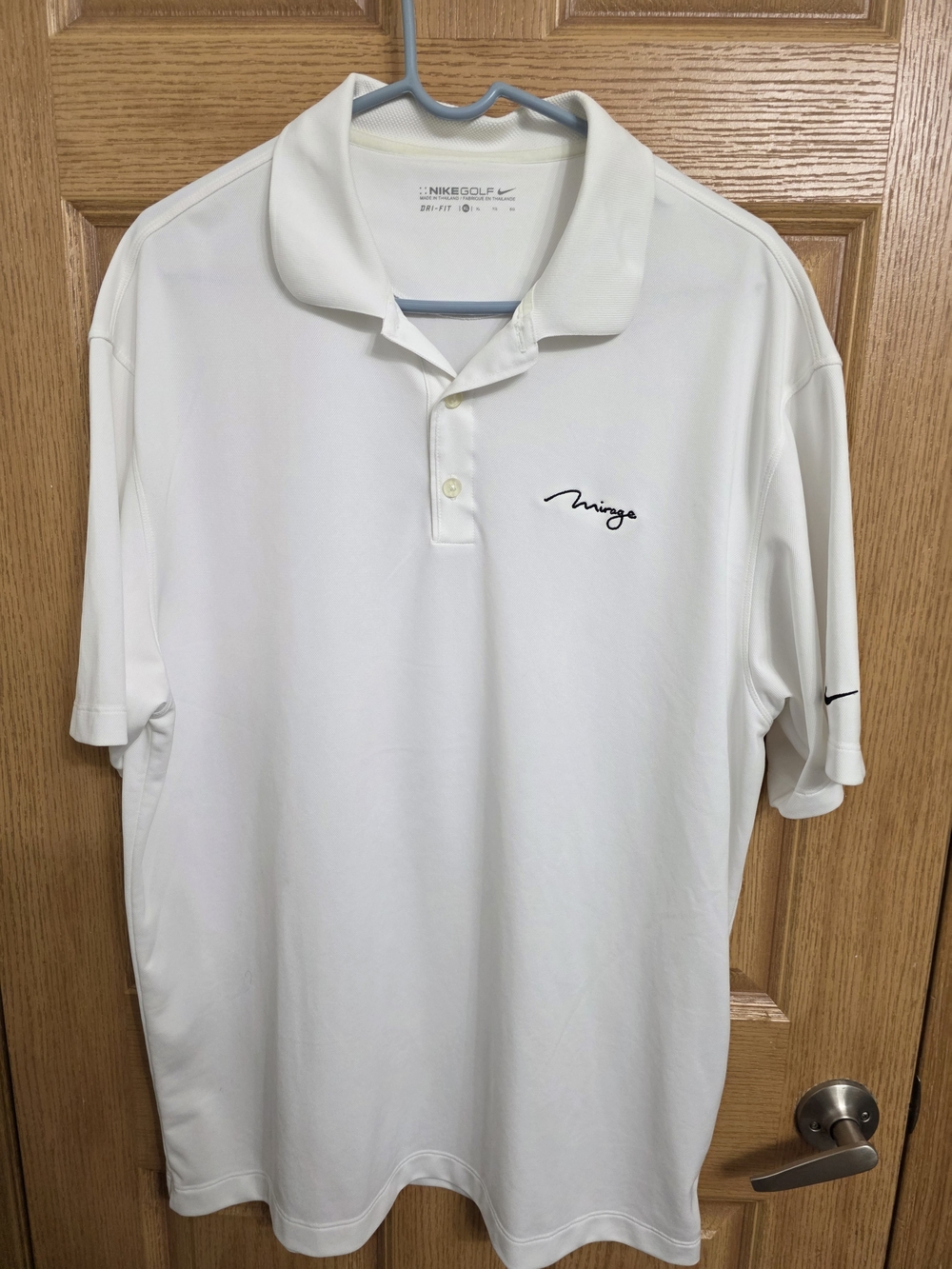 Nike White Polo with Black Script Mirage Chest Logo
